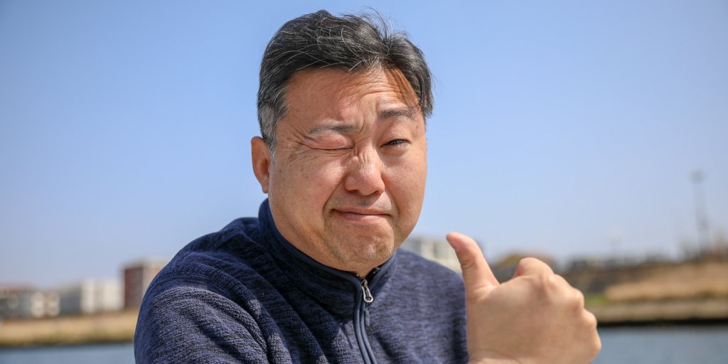 日差しで眩しそうなJTB石井さん